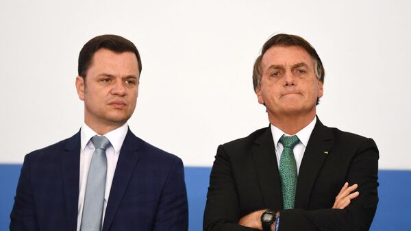 El exministro de Justicia y Seguridad Pública de Brasil, Anderson Torres, y el expresidente del país, Jair Bolsonaro - Sputnik Mundo
