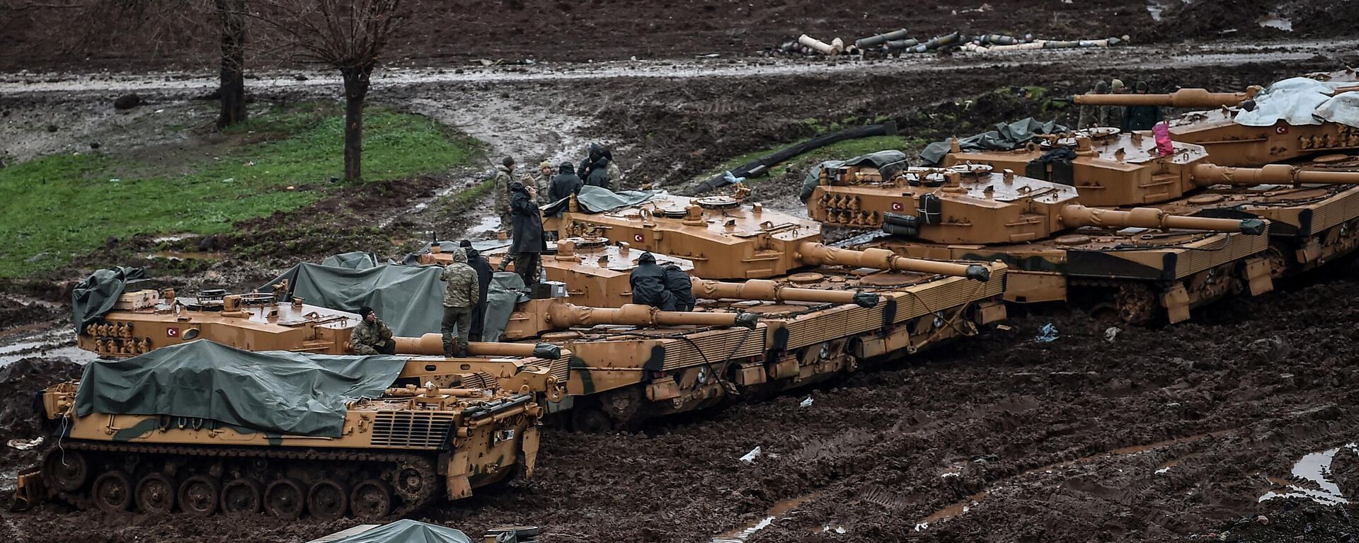 Soldados turcos sobre sus tanques de batalla Leopard 2A4 de fabricación alemana en 2018 (archivo) - Sputnik Mundo, 1920, 16.02.2023