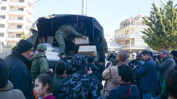 En la base aérea rusa de Hmeymim, en Siria, empezaron a distribuir ayuda humanitaria a las víctimas tras los devastadores terremotos, el 13 de febrero de 2023  - Sputnik Mundo