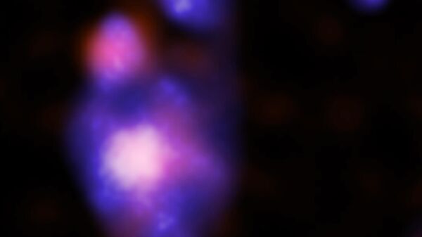 Imagen del observatorio Chandra sobre el descubrimiento de los agujeros negros gigantes en curso de colisión - Sputnik Mundo