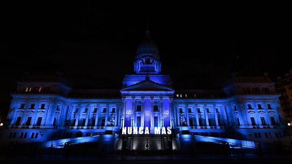 El Congreso argentino se iluminó en el marco del Día Nacional de la Memoria por la Verdad y la Justicia - Sputnik Mundo
