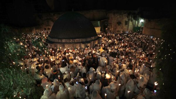 El fuego sagrado, o luz sagrada en Jerusalén - Sputnik Mundo