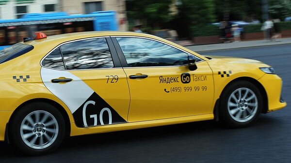 El servicio de taxi Yandex Go  - Sputnik Mundo