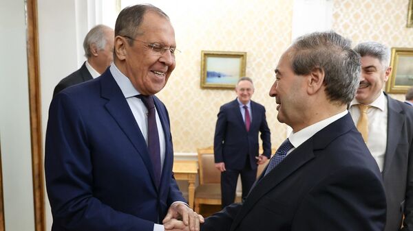 Sergei Lavrov y Faisal Mikdad - Sputnik Mundo