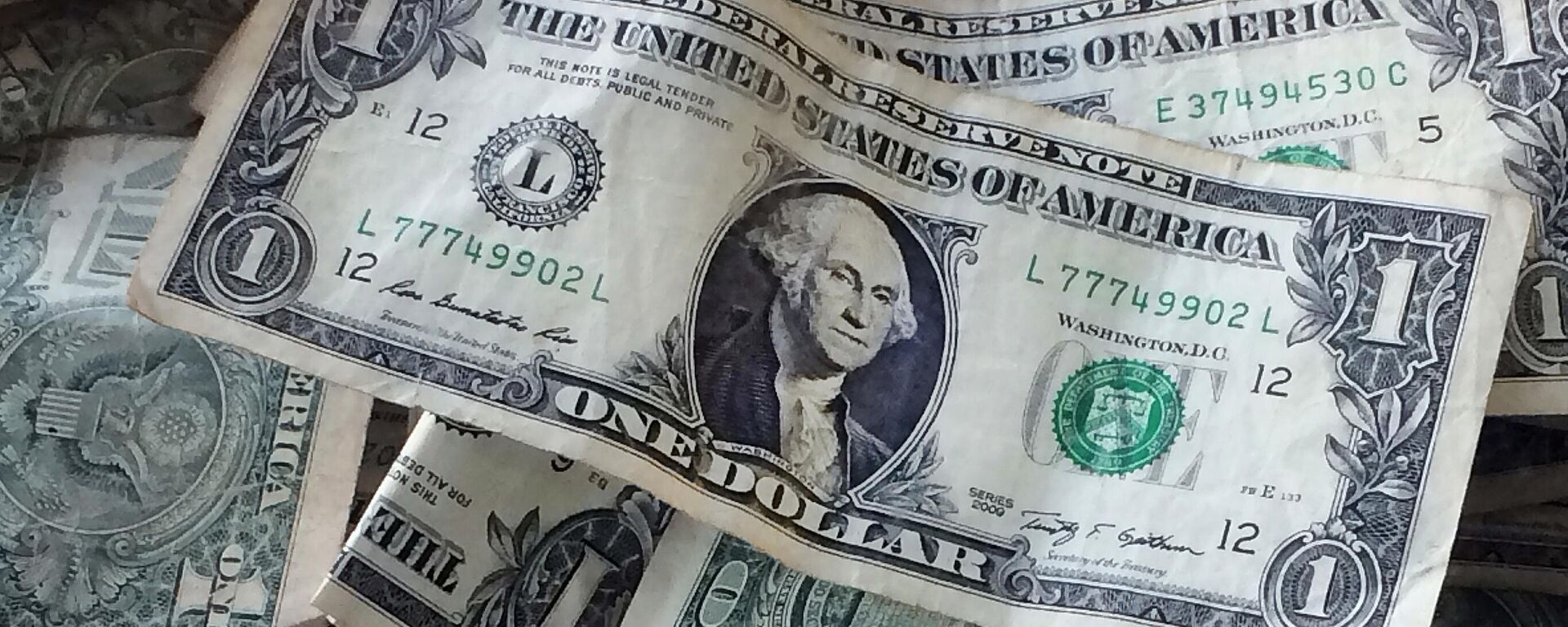 El dólar es una de las monedas más importantes del mundo y es originaria de Estados Unidos - Sputnik Mundo, 1920, 12.05.2023
