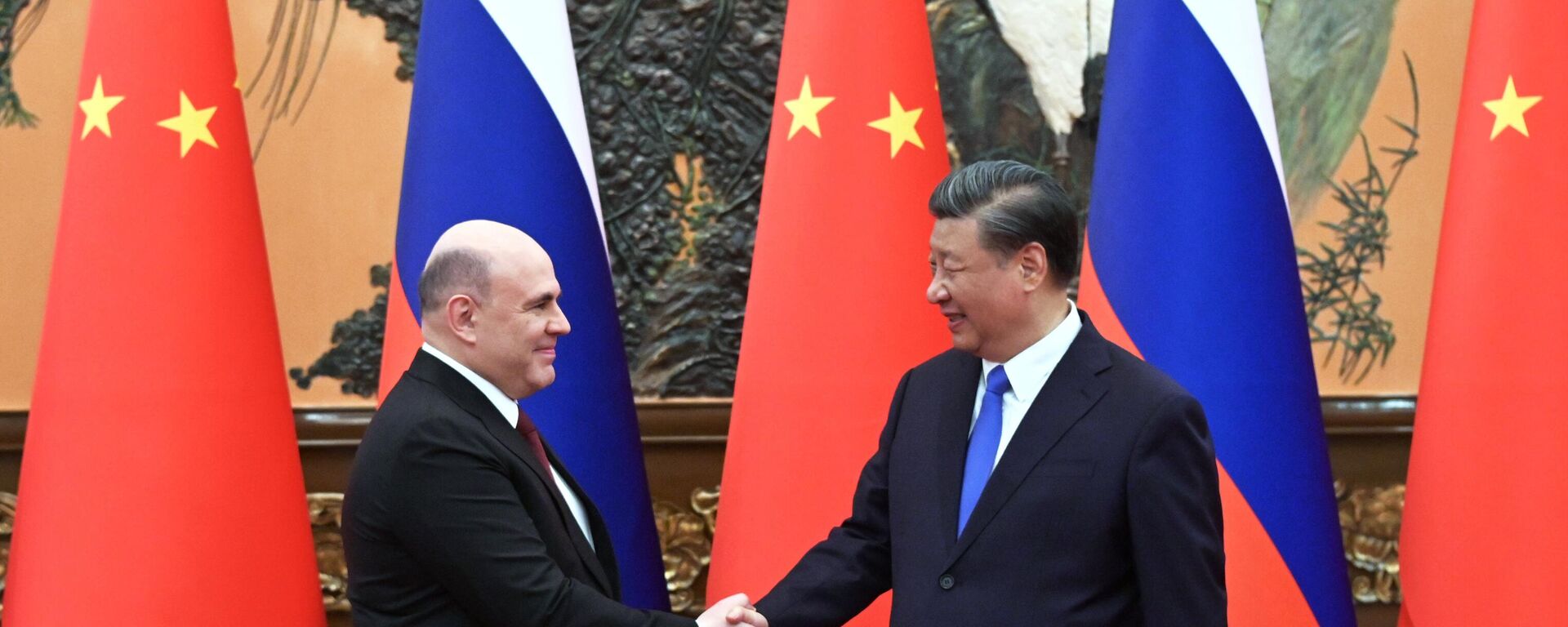 El primer ministro ruso, Mijaíl Mishustin, en la reunión con el líder chino, Xi Jinping - Sputnik Mundo, 1920, 24.05.2023
