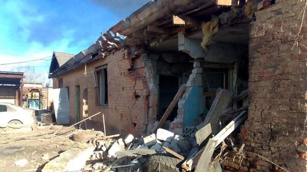 Consecuencias del bombardeo ucraniano contra la ciudad de Shebékino - Sputnik Mundo