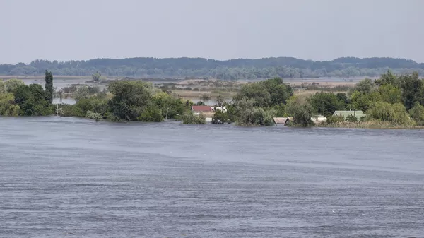 Visión general de las inundaciones por los ataques a la presa de Kajovka, en la región de Jersón.  - Sputnik Mundo