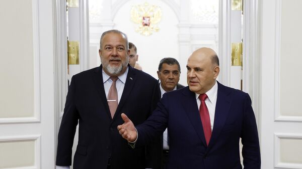 El primer ministro cubano, Manuel Marrero, y su homólogo ruso, Mijaíl Mishustin, el 13 de junio de 2023  - Sputnik Mundo