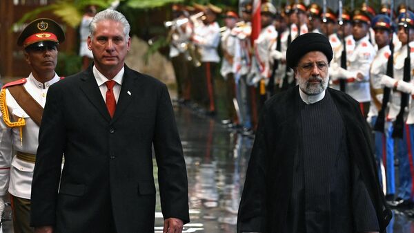 El presidente cubano, Miguel Diaz-Canel, y su homólogo de Irán, Seyed Ebrahim Raisi - Sputnik Mundo
