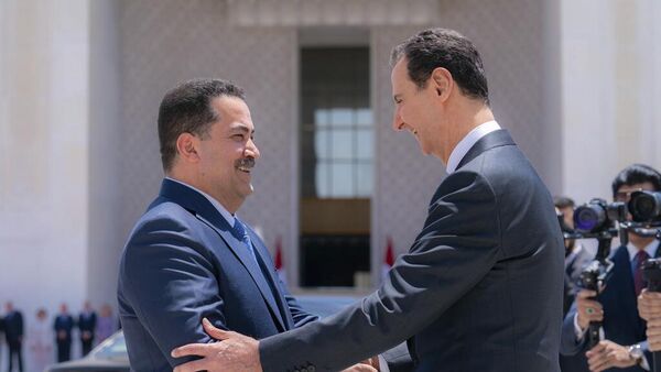 El presidente sirio, Bashar al Assad, recibió al Primer Ministro de Irak,  Mohammed Shia al-Sudani, este domingo en Damasco. - Sputnik Mundo
