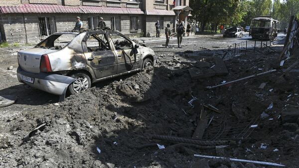 Las consecuencias de los bombardeos ucranianos en Donetsk - Sputnik Mundo
