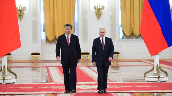 El presidente chino, Xi Jinping, junto al presidente ruso, Vladímir Putin - Sputnik Mundo