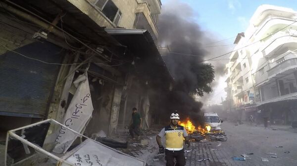 Consecuencias del ataque lanzado contra una academia militar de Homs, Siria - Sputnik Mundo