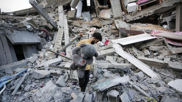La situación humanitaria en la Franja de Gaza es descrita por Naciones Unidas como terrible tras tres semanas de asedio desde Israel - Sputnik Mundo