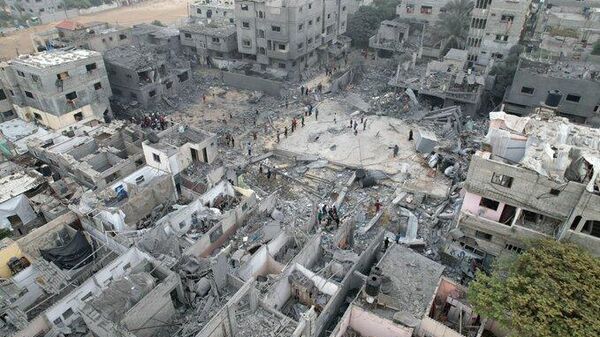 Bombardeos israelíes contra refugios en la Franja de Gaza  - Sputnik Mundo