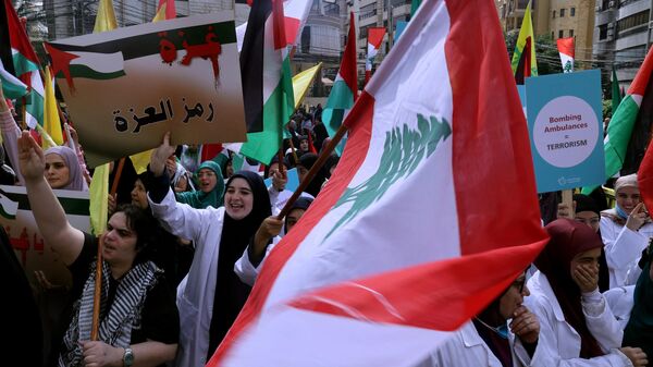 La gente en Beirut marcha a favor de Palestina, el 13 de octubre de 2023 (Imagen referencial) - Sputnik Mundo