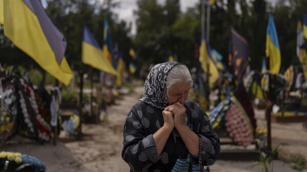 Un cementerio ucraniano - Sputnik Mundo