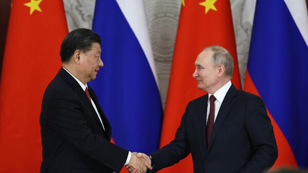 El mandatario chino, Xi Jinping, y el presidente ruso, Vladímir Putin - Sputnik Mundo