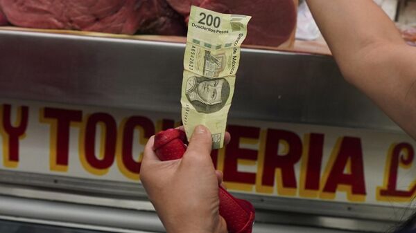 El peso mexicano ha tenido un desempeño positivo en los últimos tiempos. - Sputnik Mundo