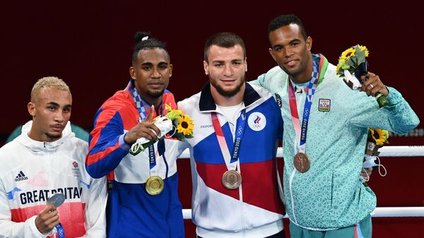 Ganadores de la competición masculina de boxeo de 81 kg de los XXXII Juegos Olímpicos  - Sputnik Mundo