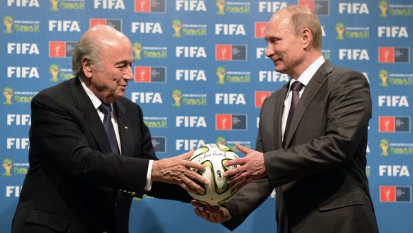 Presidente de la FIFA, Joseph Blatter y presidente de Rusia, Vladímir Putin - Sputnik Mundo
