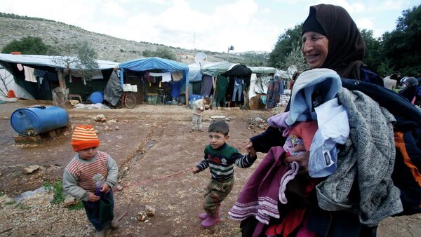 Oposición siria llama a comunidad internacional a ayudar a refugiados que sufren por frío - Sputnik Mundo