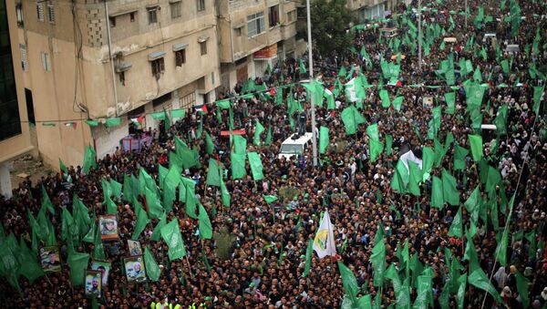 Los partidarios de Hamas en una marcha - Sputnik Mundo
