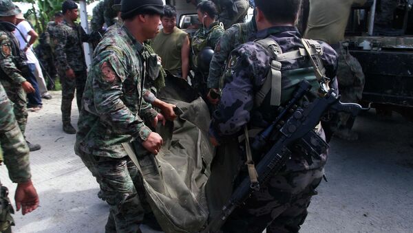 Al menos 43 muertos en enfrentamientos entre policías y rebeldes en Filipinas - Sputnik Mundo