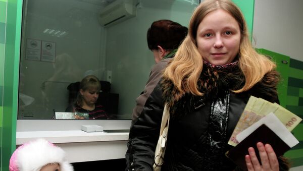 Las milicias de Donetsk pagan prestaciones sociales a más de 250.000 habitantes - Sputnik Mundo