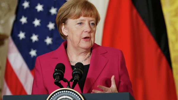 German Chancellor Angela Merkel speaks as she holds a joint news conference with U.S. President Barack Obama in the East Room of the White House in Washington February 9, 2015 - Sputnik Mundo