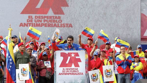 Venezuela's President Nicolas Maduro (C) speaks during a rally to commemorate the 26th anniversary of the social uprising known as 'Caracazo' - Sputnik Mundo