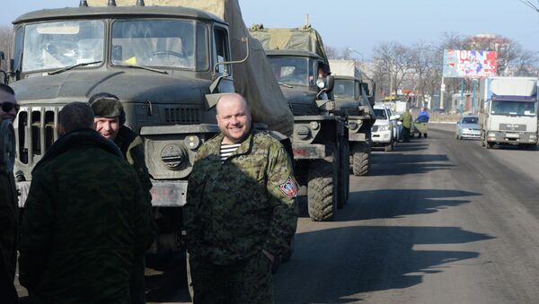 Las milicias de Donbás afirman haber terminado la retirada de armas pesadas - Sputnik Mundo