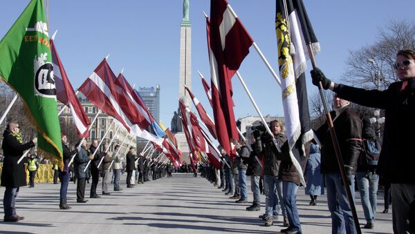 Marcha de los ex legionarios de las Waffen SS en Riga (archivo de 2013) - Sputnik Mundo