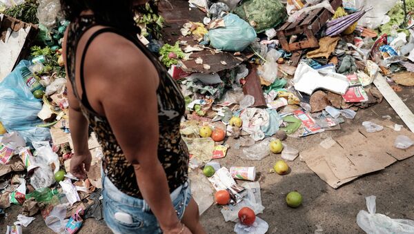 Las inundaciones y la huelga de trabajadores de la limpieza afectan a Río de Janeiro - Sputnik Mundo