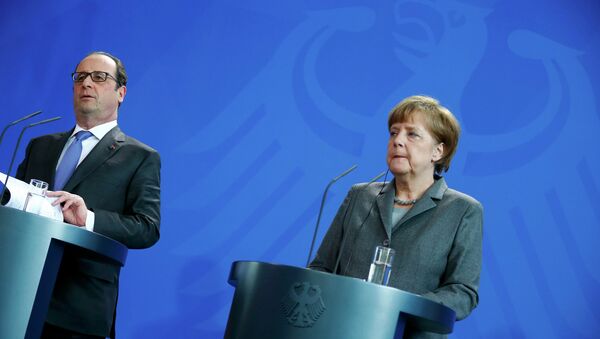 François Hollande, presidente de Francia y Angela Merkel, canciller de Alemania - Sputnik Mundo