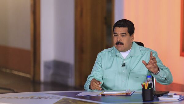 Venezuela's President Nicolas Maduro speaks during his weekly broadcast en contacto con Maduro (In contact with Maduro) in Caracas - Sputnik Mundo