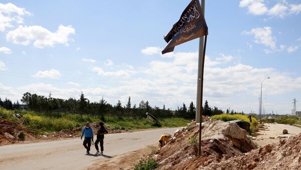 Bandera de Frente al Nusra en la ciudad de Idlib - Sputnik Mundo