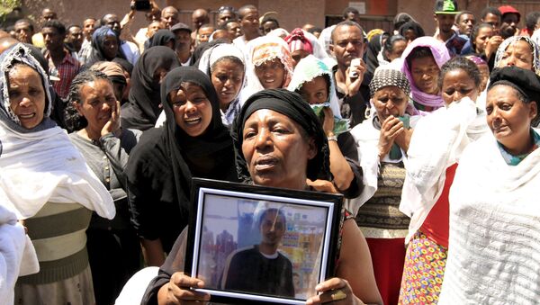 Manifestación en Etiopía contra las ejecuciones de cristianos etíopes por el grupo yihadista Estado Islámico (EI) en Libia - Sputnik Mundo