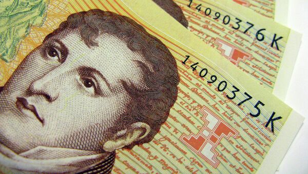 Peso argentino (imagen referencial) - Sputnik Mundo