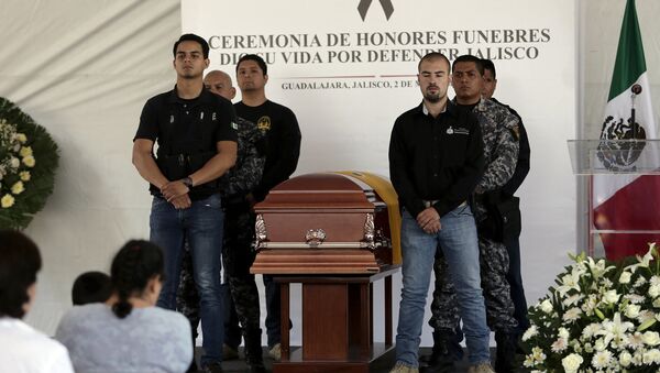 Se eleva a 15 muertos balance de ola de violencia en Jalisco, centro de México - Sputnik Mundo