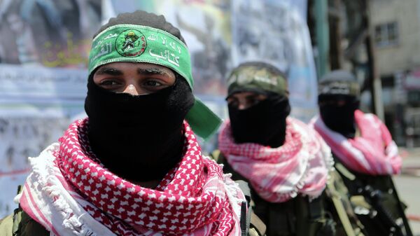 Militantes de las Brigadas de Ezzeldin Al-Qassam, brazo armado de Hamás - Sputnik Mundo
