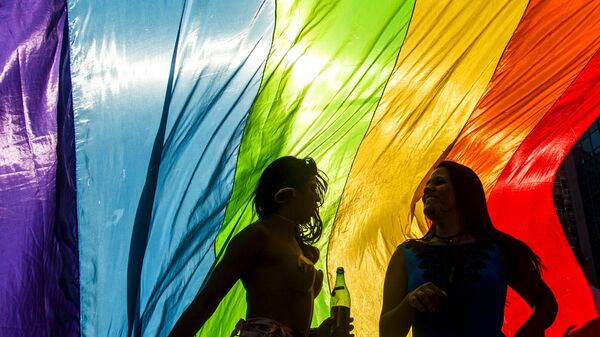 Revellers take part in the 19th Gay Pride parade along Paulista Avenue in Sao Paulo, Brazil, June 7, 2015 - Sputnik Mundo