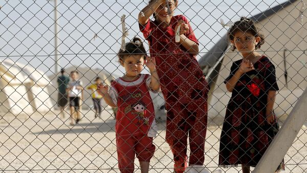 Niños en el campo de refugiados sirios e iraquíes en Midyat, Turquía, el 20 de junio, 2015 - Sputnik Mundo