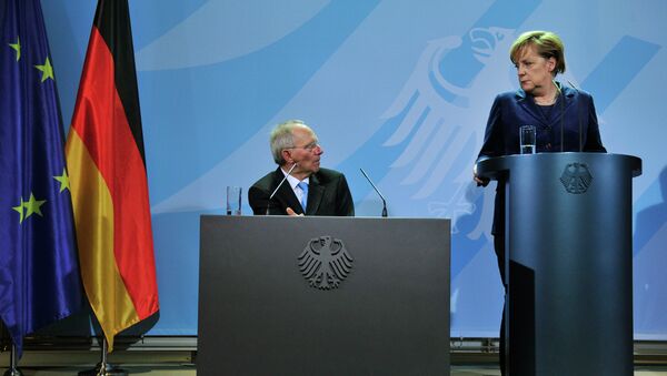 Ministro de Finanzas de Alemania, Wolfgang Schauble y canciller de Alemania Angela Merkel - Sputnik Mundo