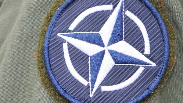 Logo de la OTAN - Sputnik Mundo
