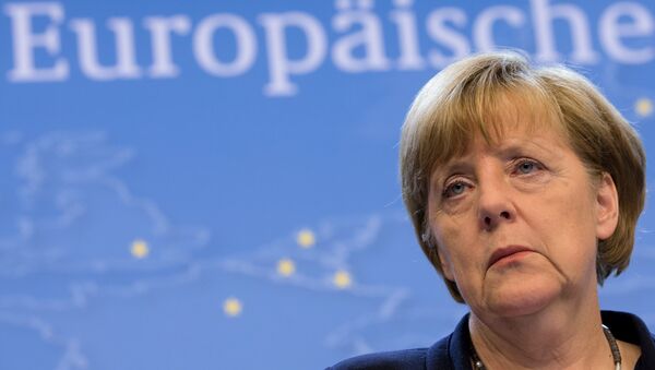 La canciller de Alemania, Angela Merkel, en la conferencia de prensa después de una cumbre en Bruselas - Sputnik Mundo