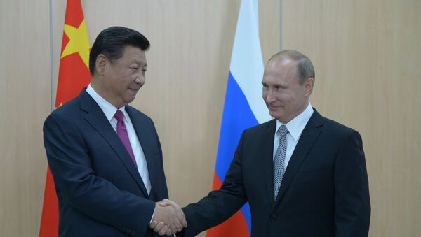 Xi Jinping, presidente de China, y Vladímir Putin, presidente de Rusia - Sputnik Mundo