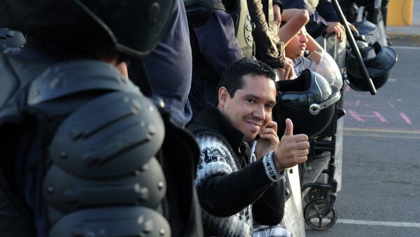 Un miembro del movimiento hondureño de oposición indignada, Ariel Varela - Sputnik Mundo