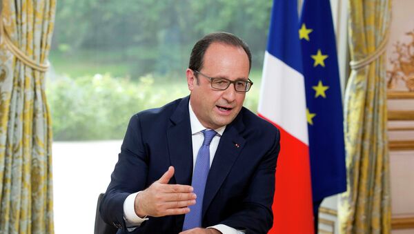 François Hollande, presidente de Francia, en Paris, el 14 de julio, 2015 - Sputnik Mundo